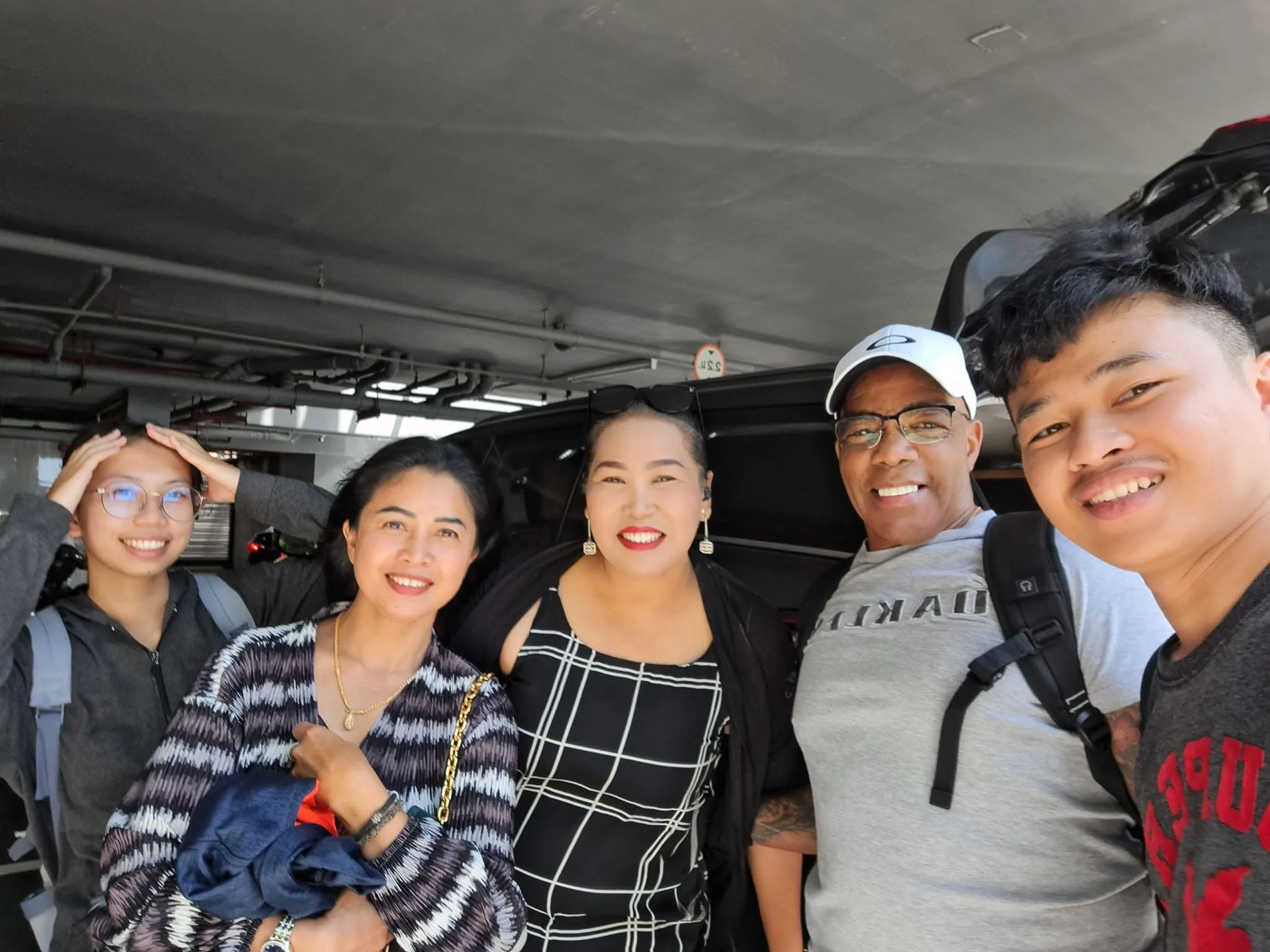 A happy customer group with Ms. Mam