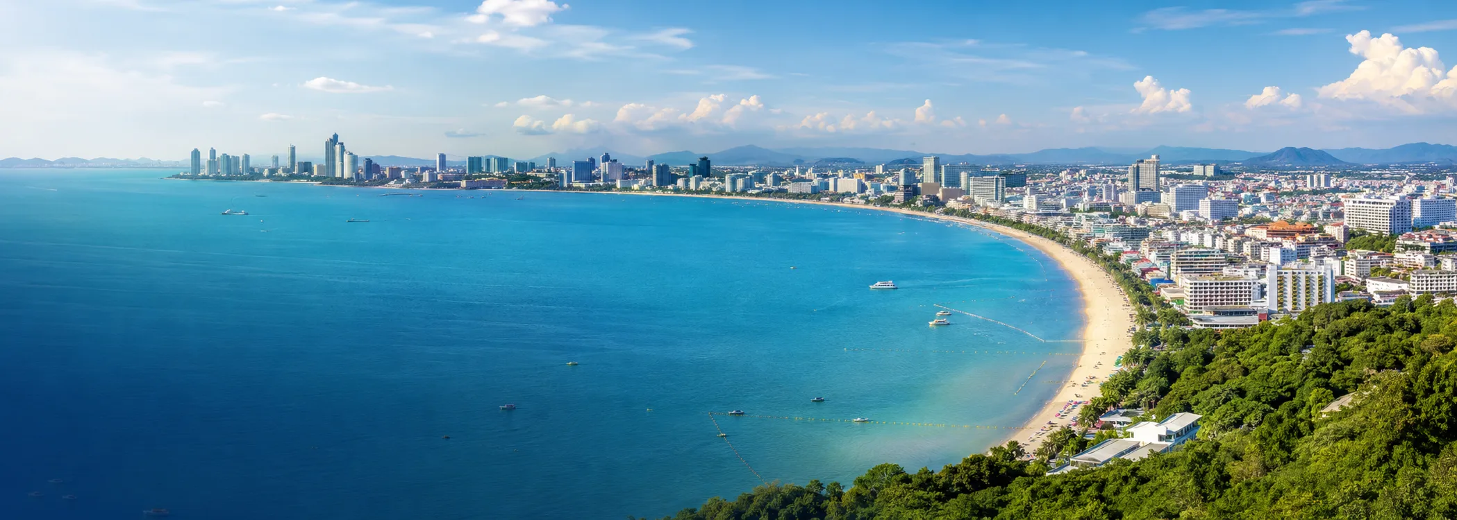 Aerial view of Pattaya Bay with the beach and city skyline